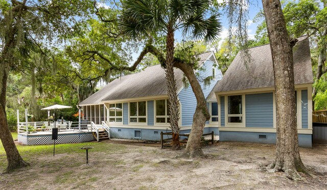 2653 Seabrook Island Rd, Seabrook Island, SC 29455 - back of house featuring crawl space, a sunroom, a deck, and roof with shingles