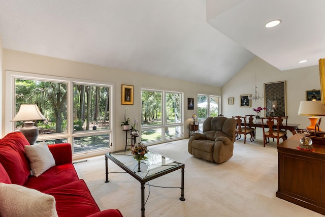 2653 Seabrook Island Rd, Seabrook Island, SC 29455 - living room featuring light colored carpet, healthy amount of natural light, and high vaulted ceiling