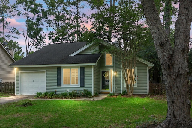 7886 Racquet Rd, North Charleston, SC 29418 - view of front of house with an attached garage, driveway, and roof with shingles