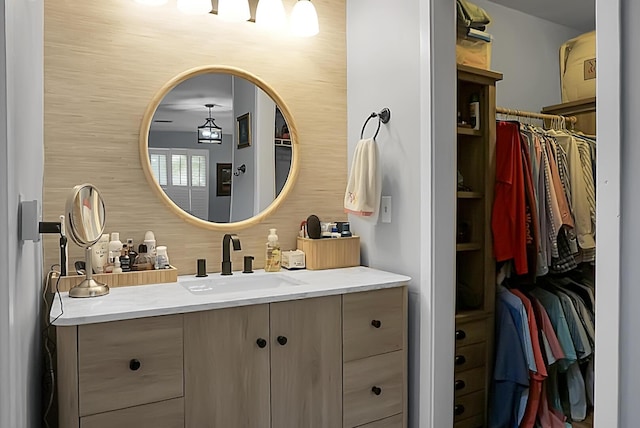 7886 Racquet Rd, North Charleston, SC 29418 - bathroom with vanity and a spacious closet
