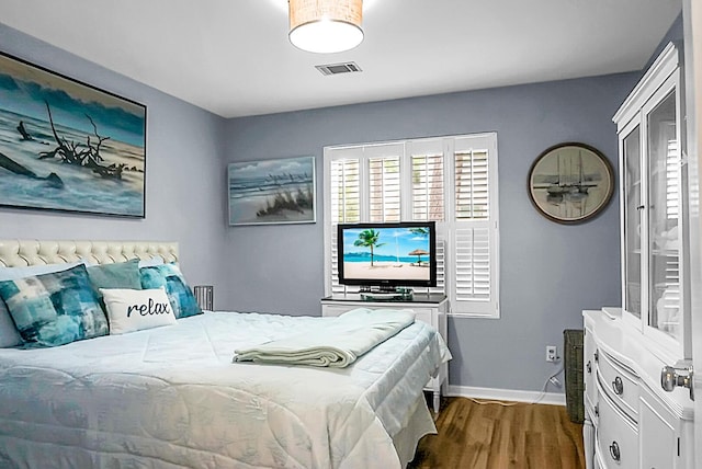 7886 Racquet Rd, North Charleston, SC 29418 - bedroom with dark wood-type flooring and baseboards