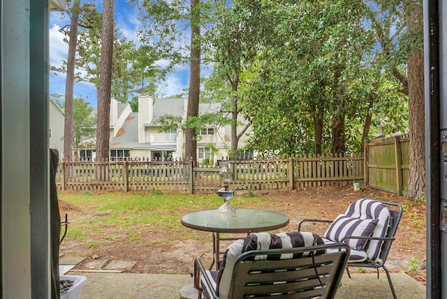 7886 Racquet Rd, North Charleston, SC 29418 - fenced backyard featuring a patio