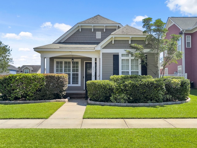 view of front of home with a front yard