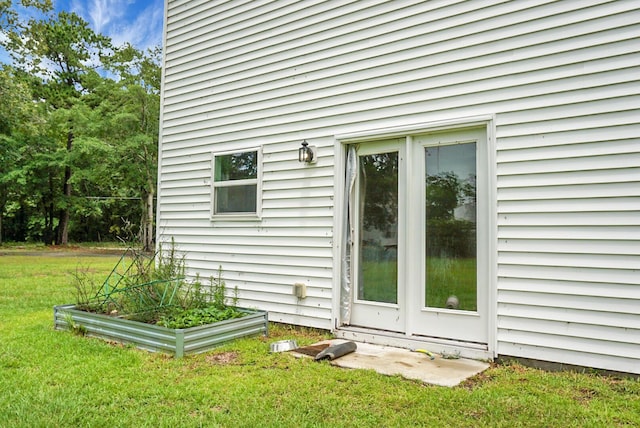 717 Butter Rd, Bonneau, SC 29431 - property entrance featuring a yard