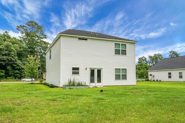 717 Butter Rd, Bonneau, SC 29431 - rear view of property with a lawn