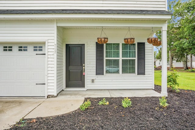717 Butter Rd, Bonneau, SC 29431 - doorway to property featuring a garage