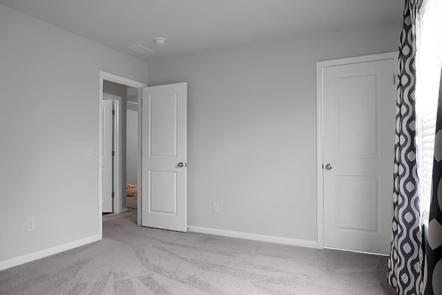 717 Butter Rd, Bonneau, SC 29431 - unfurnished bedroom featuring carpet and baseboards