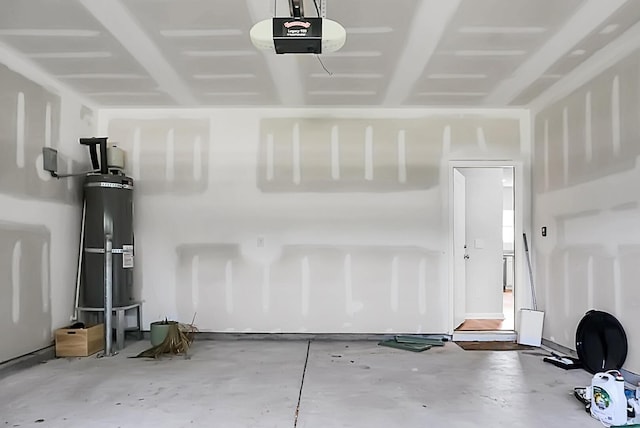 717 Butter Rd, Bonneau, SC 29431 - garage featuring a garage door opener and secured water heater