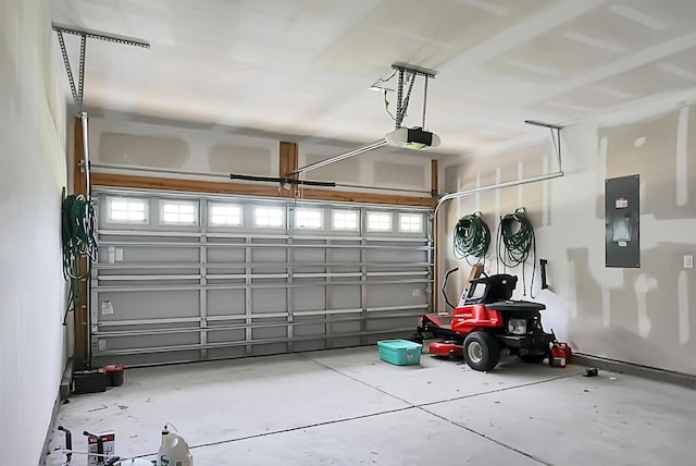 717 Butter Rd, Bonneau, SC 29431 - garage with a garage door opener and electric panel