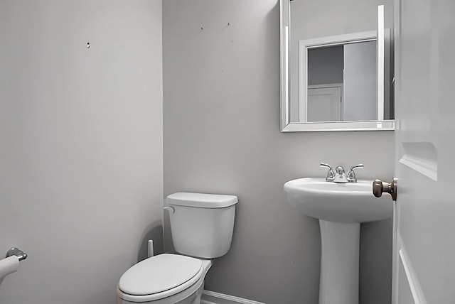 717 Butter Rd, Bonneau, SC 29431 - bathroom with toilet and a sink