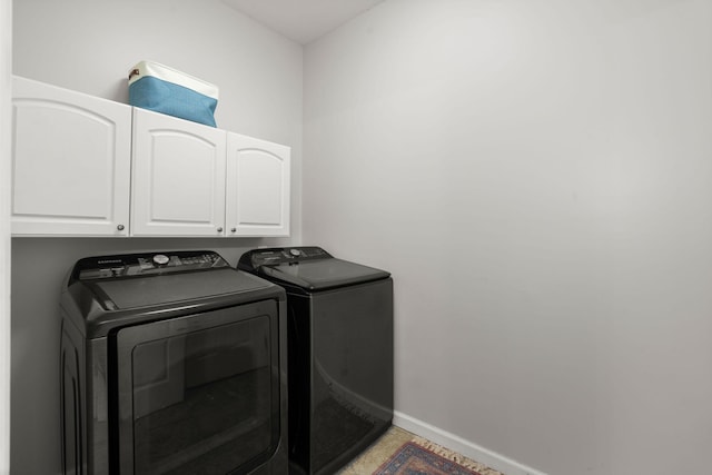 2772 Latrobe Ct, Mount Pleasant, SC 29466 - laundry room with separate washer and dryer, cabinet space, and baseboards