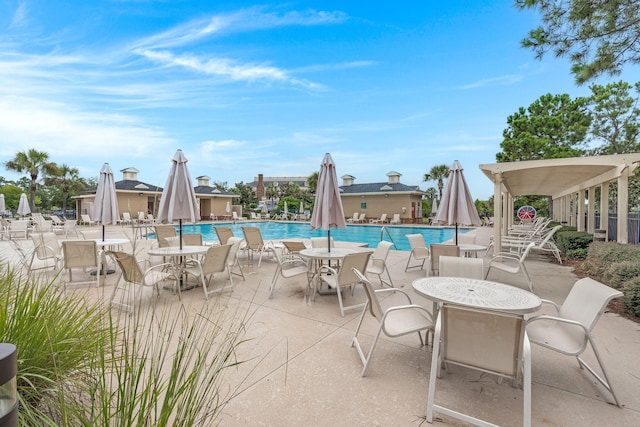 2772 Latrobe Ct, Mount Pleasant, SC 29466 - community pool with a patio area and outdoor dining space