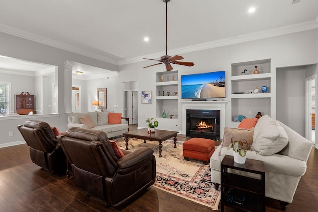 2772 Latrobe Ct, Mount Pleasant, SC 29466 - living area featuring ornamental molding, a lit fireplace, dark wood-style flooring, built in features, and baseboards