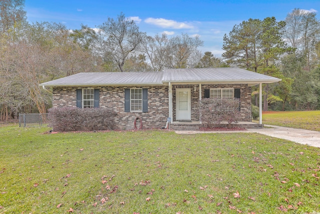 ranch-style house with a front yard