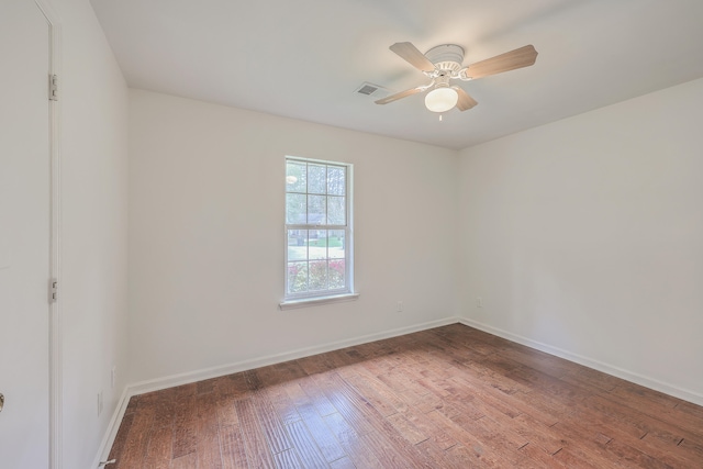 unfurnished room with hardwood / wood-style floors and ceiling fan