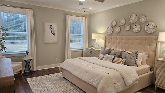 bedroom featuring multiple windows, wood finished floors, baseboards, and ornamental molding