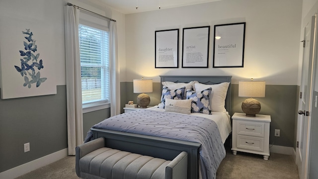 carpeted bedroom with baseboards