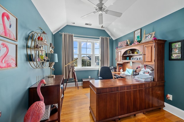 office area featuring vaulted ceiling, ceiling fan, light wood-style flooring, and visible vents