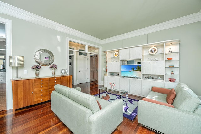 living room featuring ornamental molding and dark wood-style floors