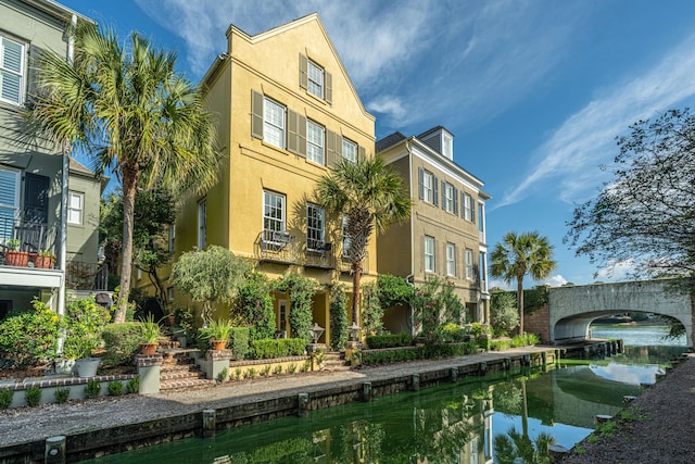 view of property with a water view