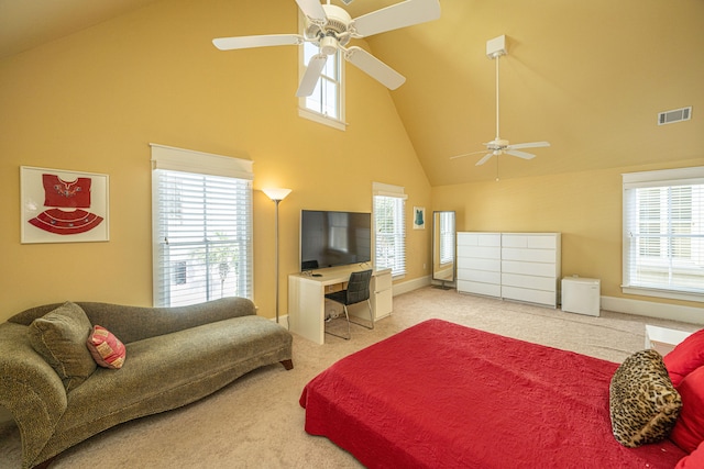 bedroom with visible vents, carpet flooring, ceiling fan, high vaulted ceiling, and baseboards