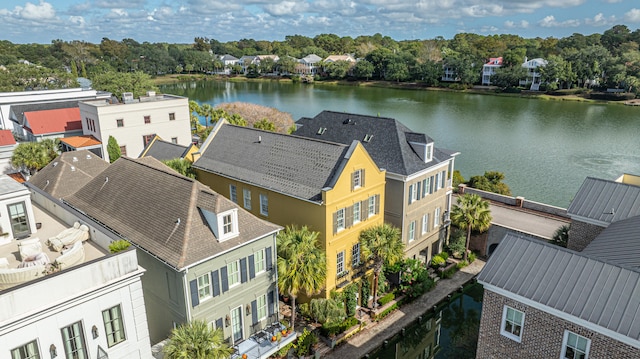 aerial view with a residential view and a water view