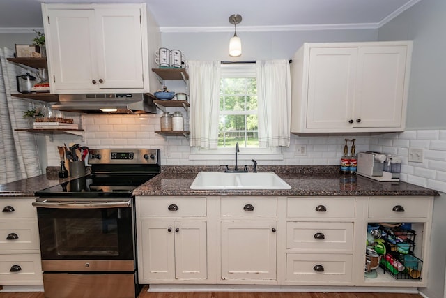 kitchen with under cabinet range hood, open shelves, stainless steel electric stove, and a sink