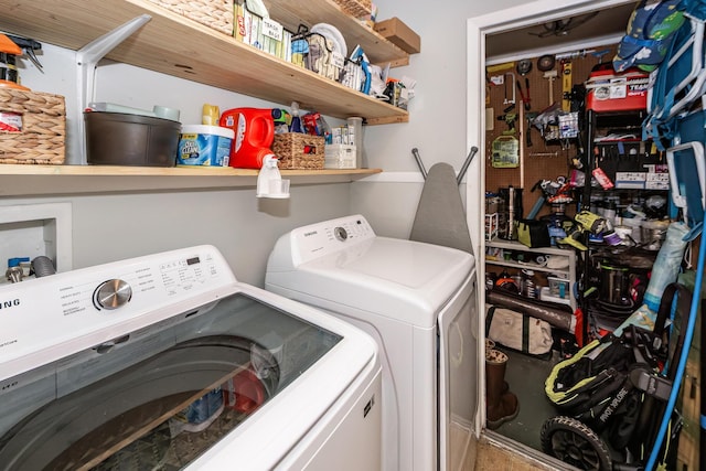 clothes washing area featuring laundry area and independent washer and dryer