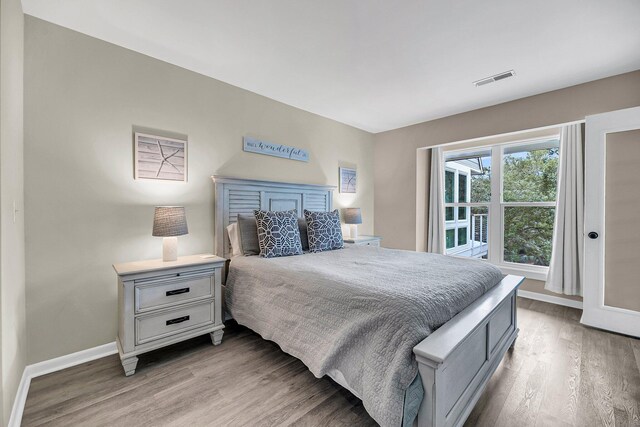 bedroom featuring hardwood / wood-style floors