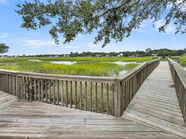 view of dock featuring a wooden deck