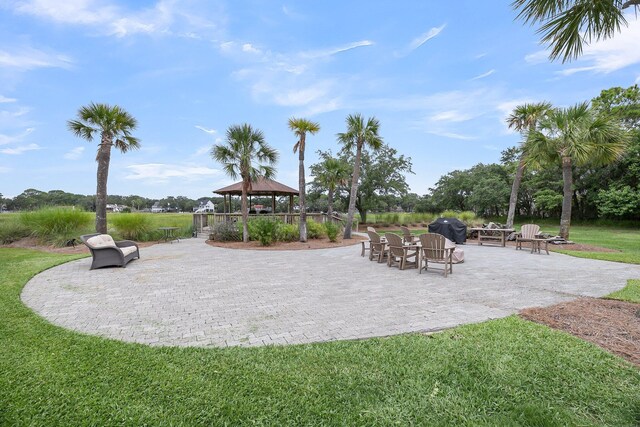 exterior space featuring a grill and a gazebo