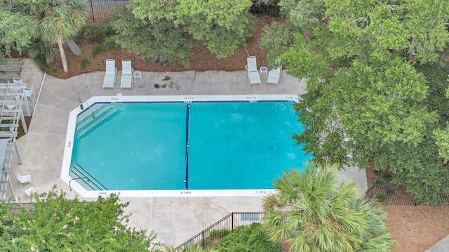 view of swimming pool with a patio