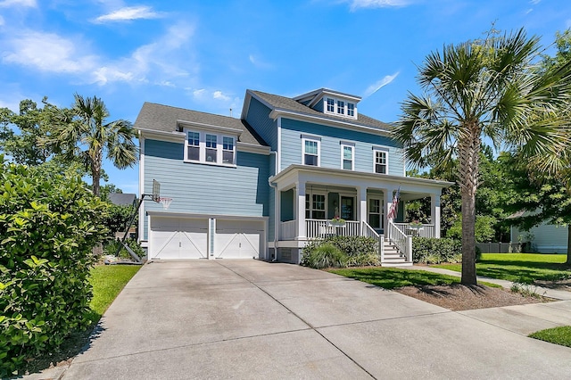 1325 Whisker Pole Ln, Mount Pleasant, SC 29466 - traditional style home featuring covered porch, concrete driveway, an attached garage, and a front yard