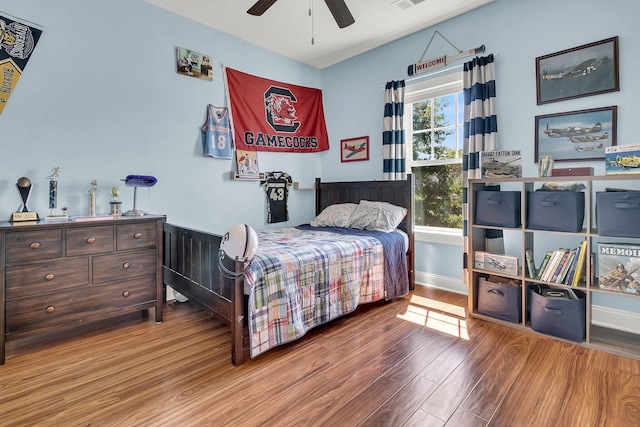 1325 Whisker Pole Ln, Mount Pleasant, SC 29466 - bedroom featuring wood finished floors, baseboards, and a ceiling fan