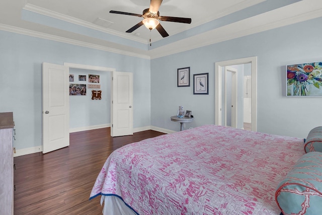 1325 Whisker Pole Ln, Mount Pleasant, SC 29466 - bedroom with dark wood-style floors, crown molding, baseboards, and a raised ceiling