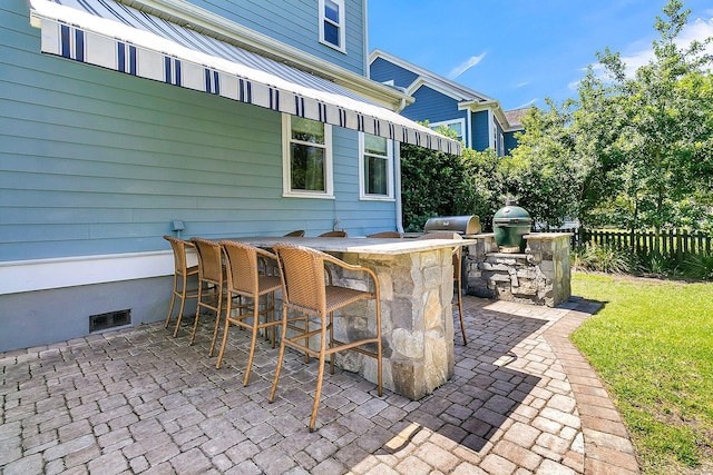 1325 Whisker Pole Ln, Mount Pleasant, SC 29466 - view of patio with a bar and an outdoor kitchen