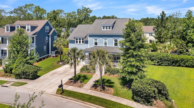 1325 Whisker Pole Ln, Mount Pleasant, SC 29466 - view of front facade featuring driveway, a front yard, stairs, and central air condition unit