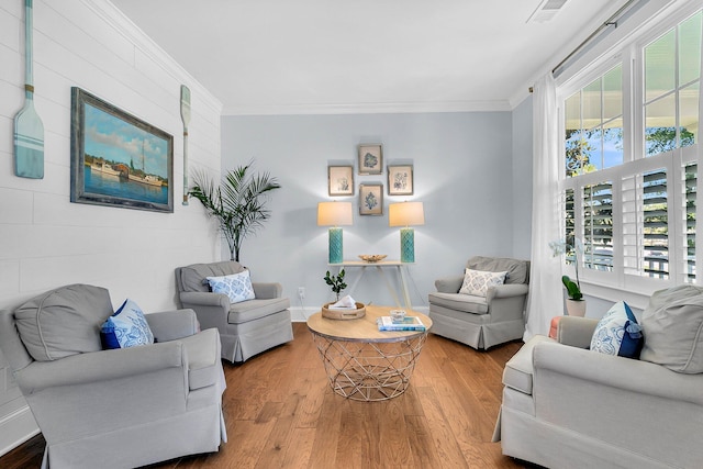 1325 Whisker Pole Ln, Mount Pleasant, SC 29466 - living room featuring ornamental molding, wood finished floors, plenty of natural light, and baseboards