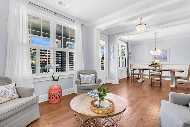 1325 Whisker Pole Ln, Mount Pleasant, SC 29466 - living area with ornamental molding, wood finished floors, and baseboards