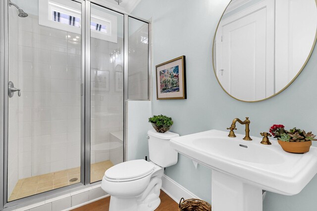 1325 Whisker Pole Ln, Mount Pleasant, SC 29466 - full bath with toilet, a shower stall, a sink, and baseboards