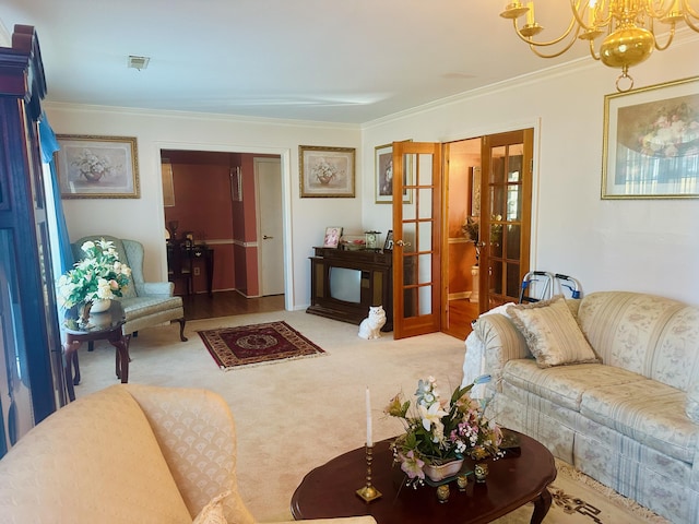 living room with crown molding, carpet flooring, a chandelier, and french doors