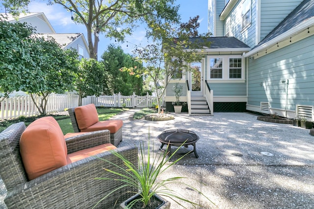 view of patio / terrace featuring a fire pit