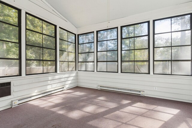 unfurnished sunroom featuring a wealth of natural light, baseboard heating, and lofted ceiling