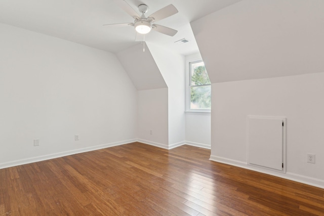 bonus room with ceiling fan, wood-type flooring, and vaulted ceiling