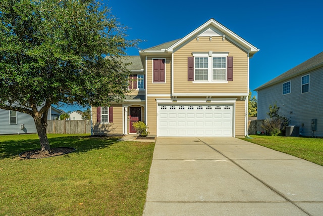 view of front property featuring a front yard, central AC, and a garage