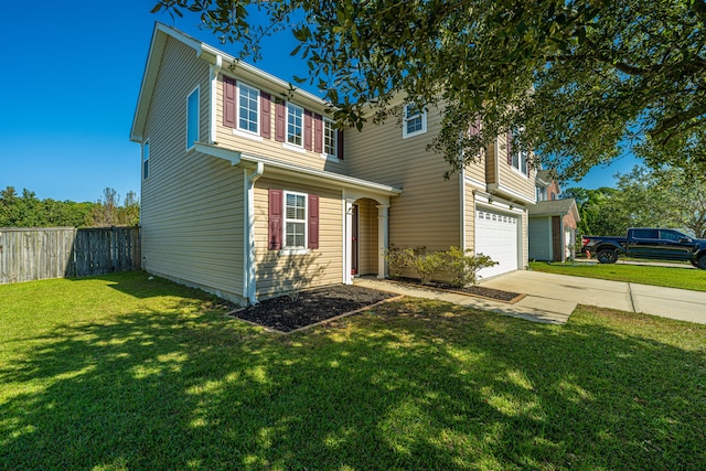 view of front facade featuring a front lawn and a garage