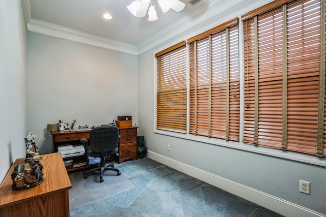 carpeted office space featuring ceiling fan and crown molding