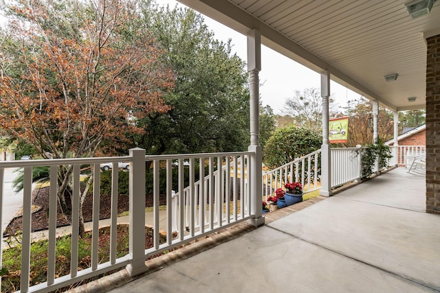 balcony featuring a porch