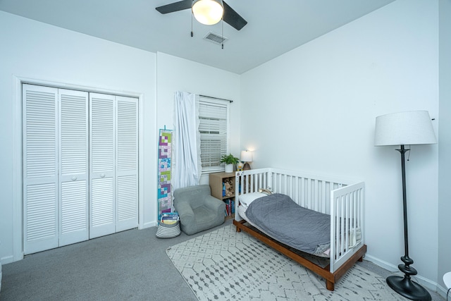 bedroom with ceiling fan and light carpet