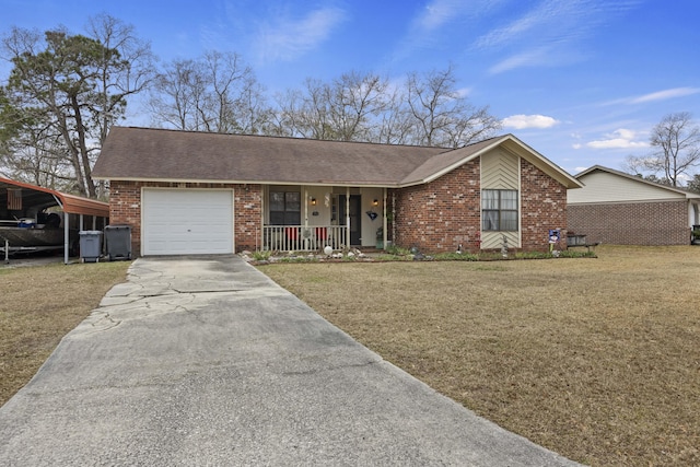 single story home with covered porch, a front yard, and a garage